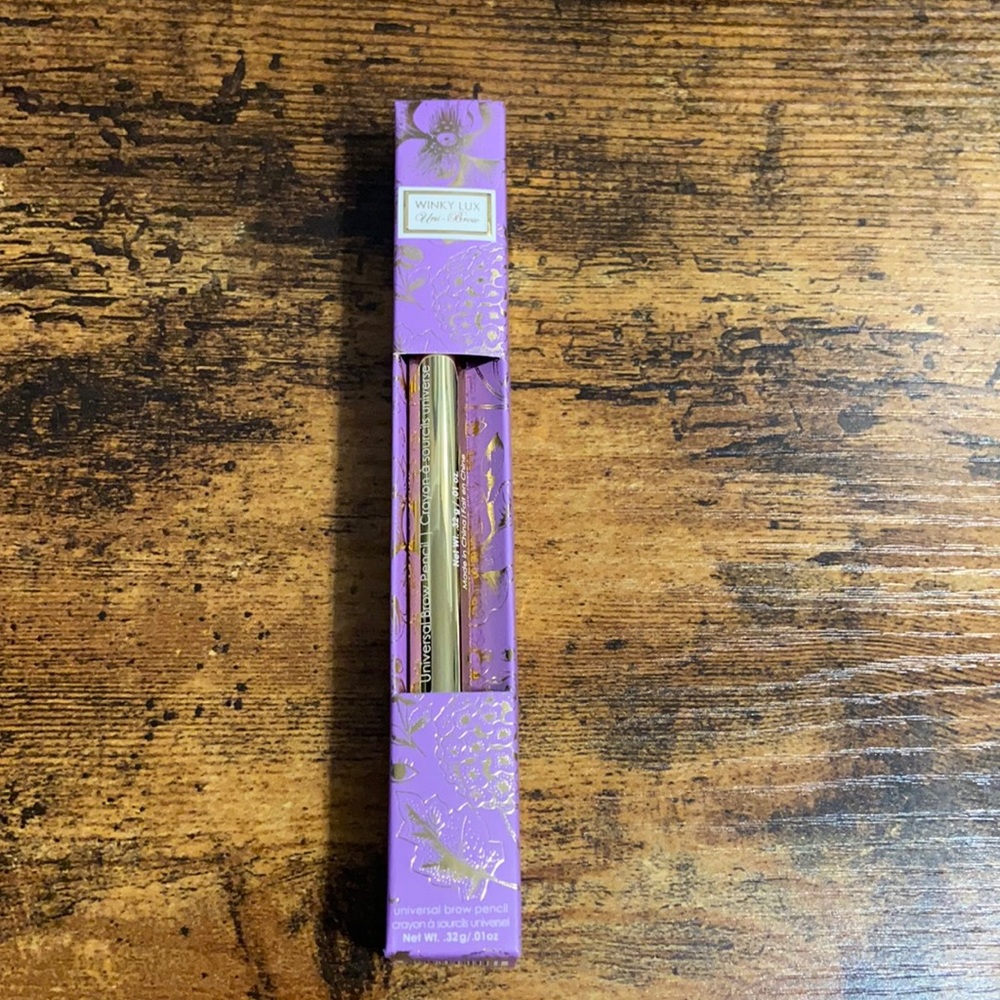 Winky Lux uni-brow